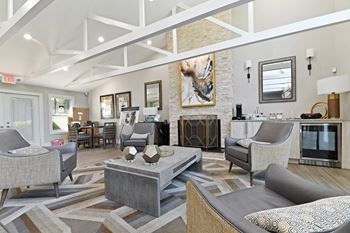 a living room filled with furniture and a fire place at Premier Apartments, Georgia